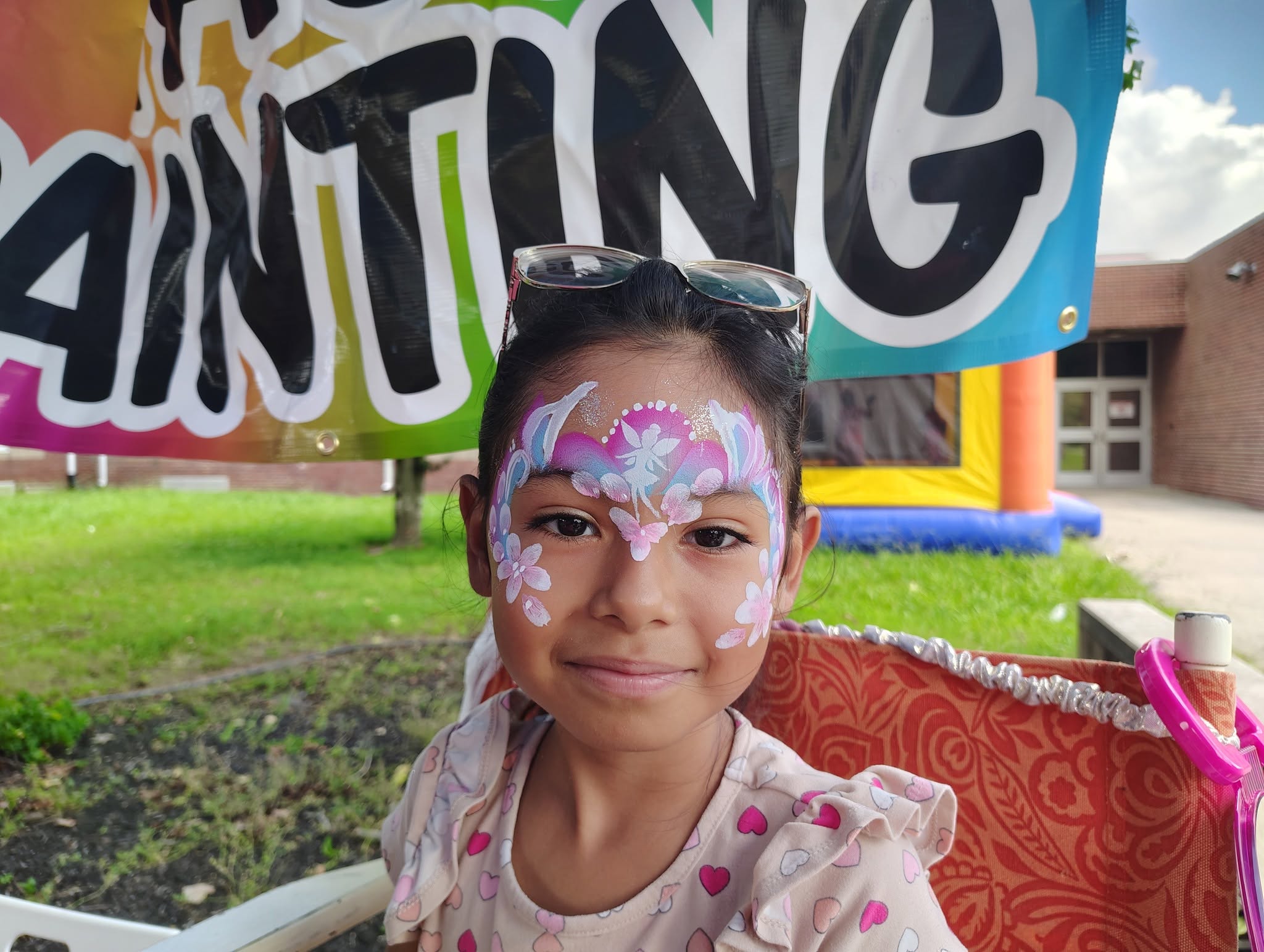 Girl with a fairy crown face painting design