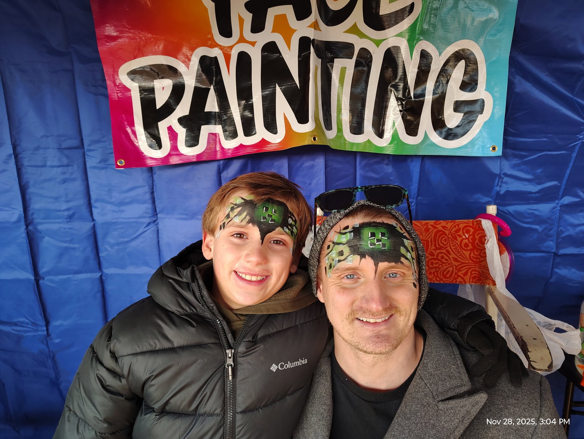 Child with a small forehead face painting accent design